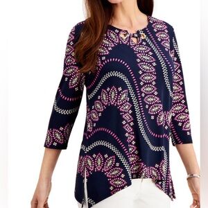 JM collection handkerchief hem blouse with gold detail on neckline.